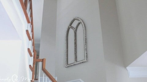 feature photo of stairway wood cathedral window wall decor