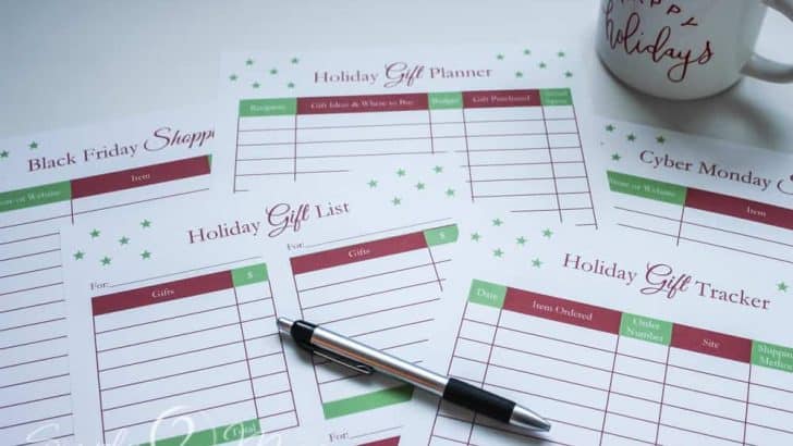overhead view of holiday gift planners with pen and mug