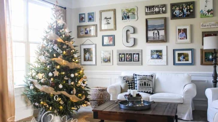 living room with Christmas tree and gallery wall over couch