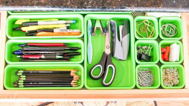 inside view of organized family kitchen desk drawer