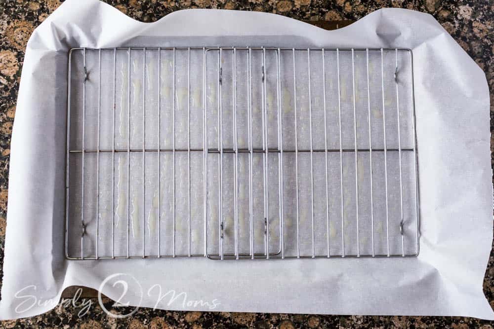 baking sheet lined with parchment paper with racks