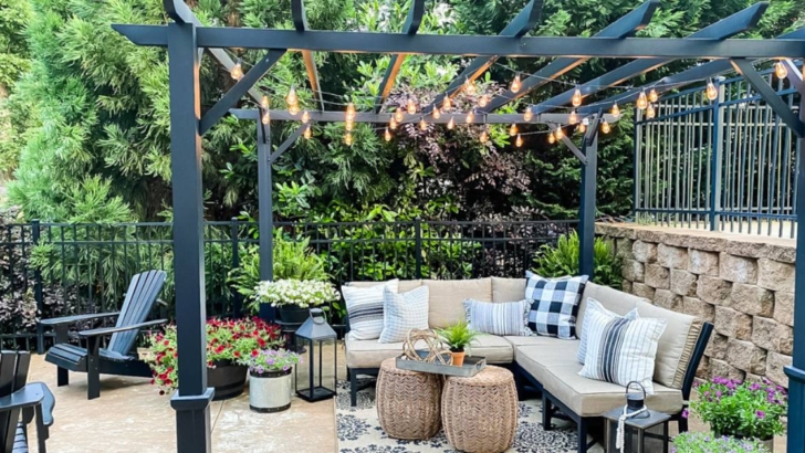 view of patio with two seating areas one under pergola and one around firepit