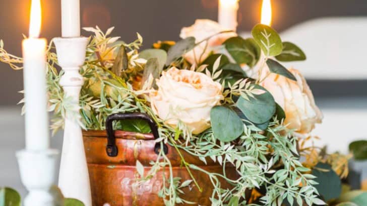 floral centerpiece with candles for Galentine tablescape feature image