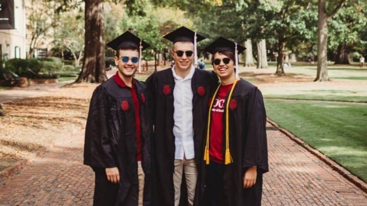 three young men in caps and gowns college graduation gift idea feature photo
