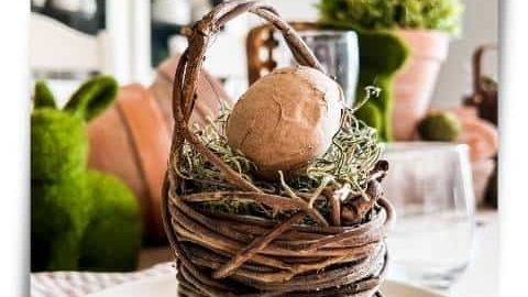 Easter brunch place setting with basket and faux paper Mache egg feature