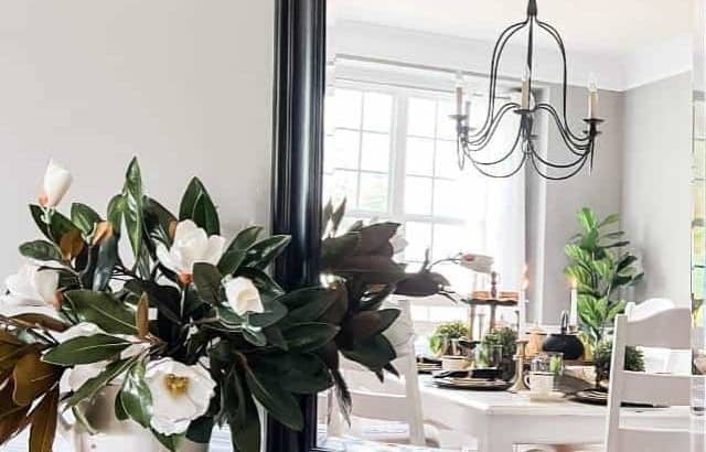 console table with mirror on top leaning against wall