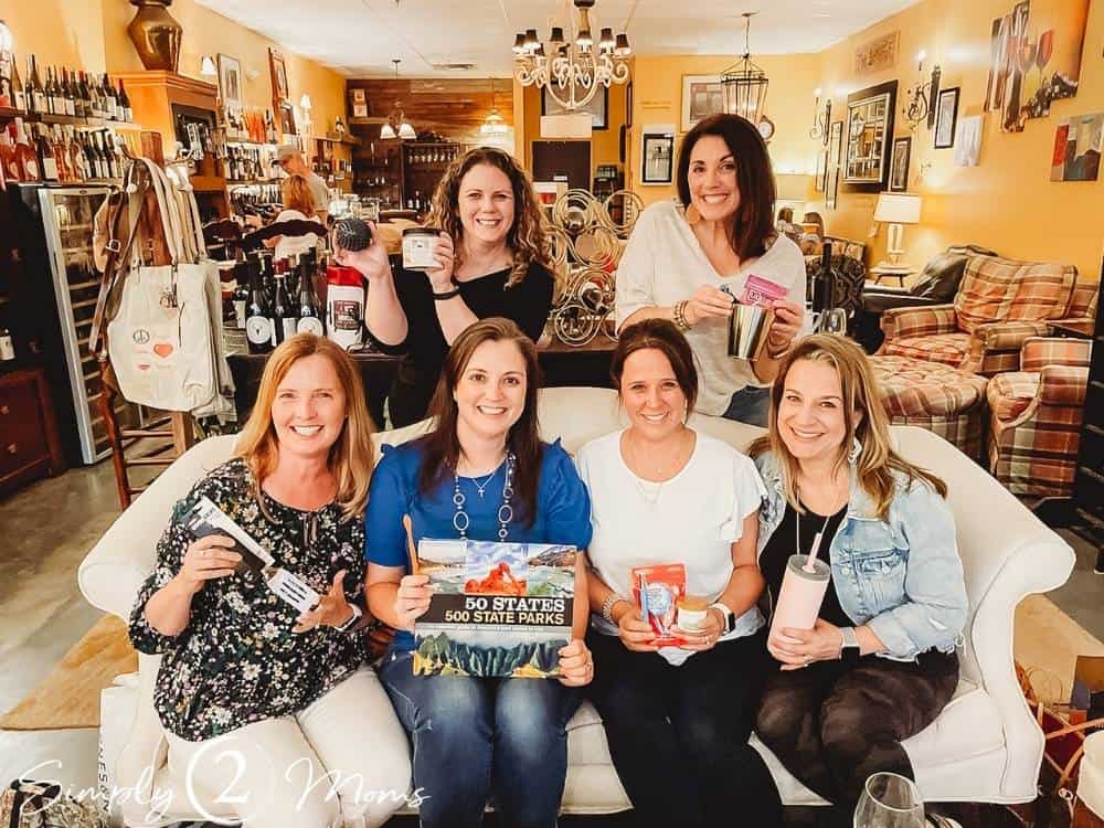group of women holding their favorite things