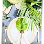 overhead view of place setting with luau greenery