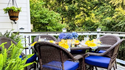 outdoor dining table on deck set for party feature photo