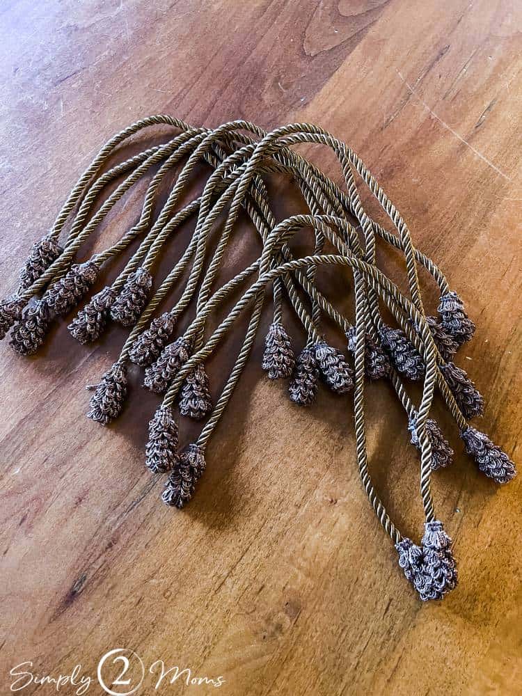 Brown garland ties for hanging garland on banisters.