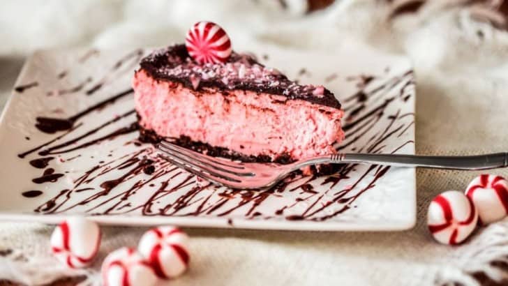 slice of peppermint chocolate cheesecake on square plate