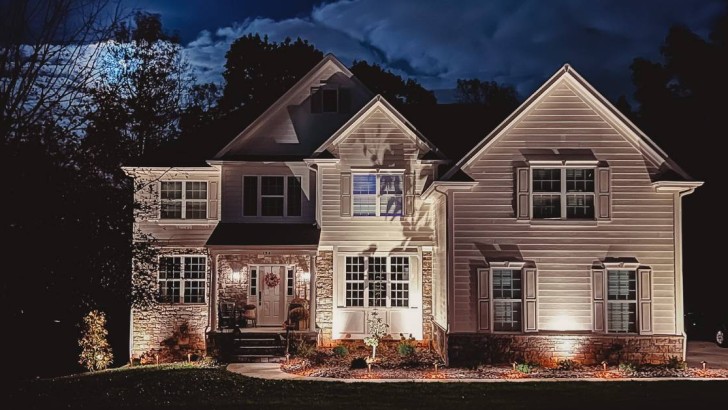 exterior of home light with landscape lighting
