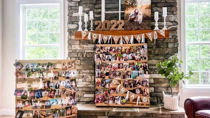 two wood pallets with printed photos hanging from twine on both