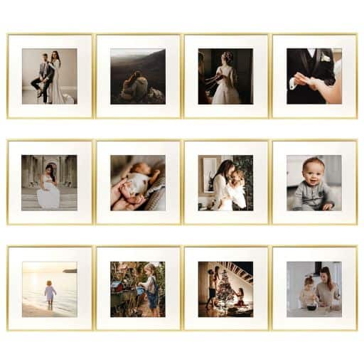 12 gallery style photo frames with white photo mats and slim gold metal frames.