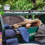vintage tool box filled with old neckties as centerpiece tablescape feature