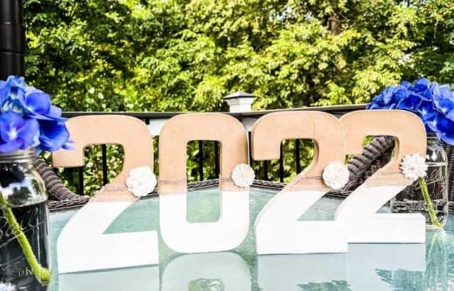 painted and decorated numbers on table outside