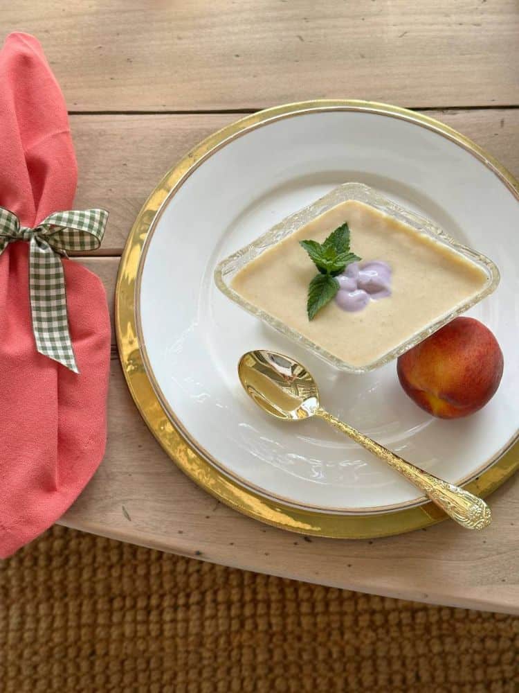 Plate with a diamond shaped bowl of cold peach soup from Vintage Home Designs.