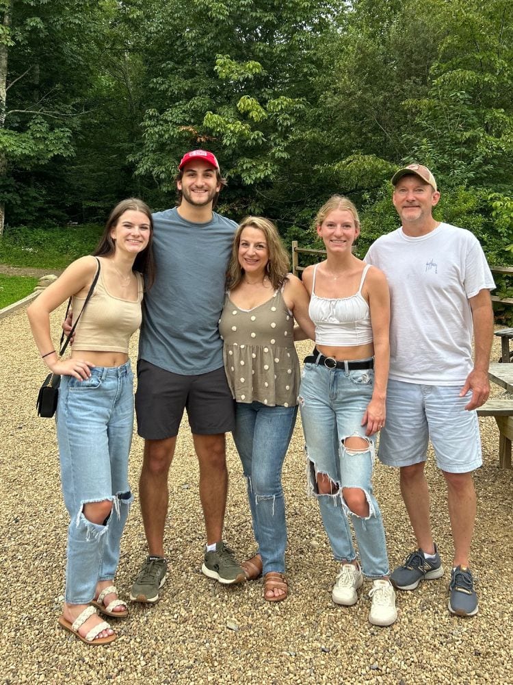 Anne from Simply2Moms with her husband and three adult children.