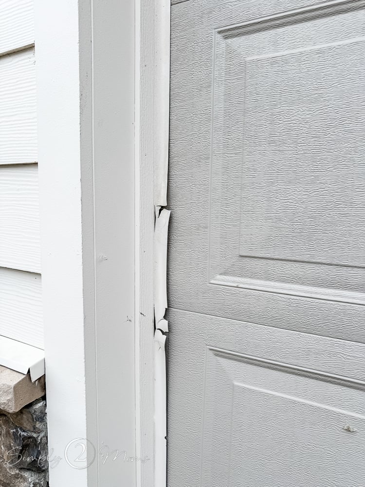 Broken and cracked weatherstripping around exterior of garage doors.