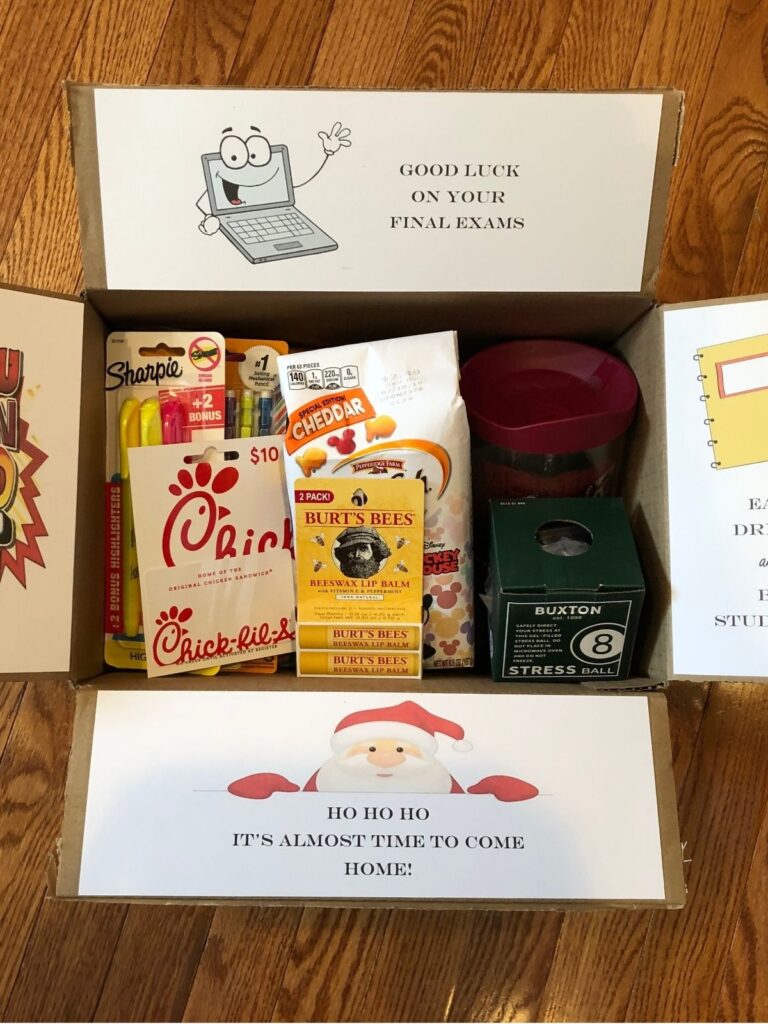College finals care package with snacks, gift card, stress relief items, and holiday-themed messages inside the box