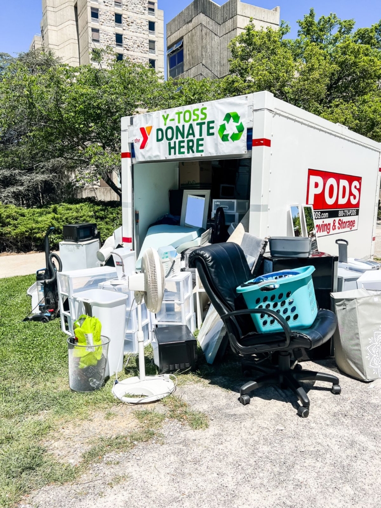 PODS storage container set up as a YMCA donation station for unwanted dorm items at move-out.